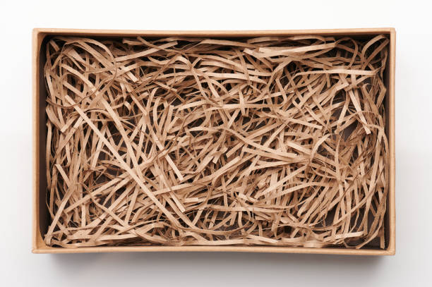 istock Open brown box with shredded paper 1301219102