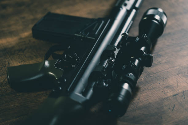istock Military rifle with optical scope 1301221986