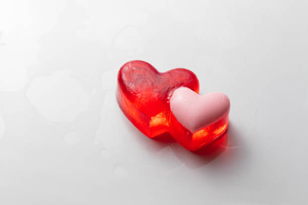 istock handmade soap with heart shape, white background 1301221991