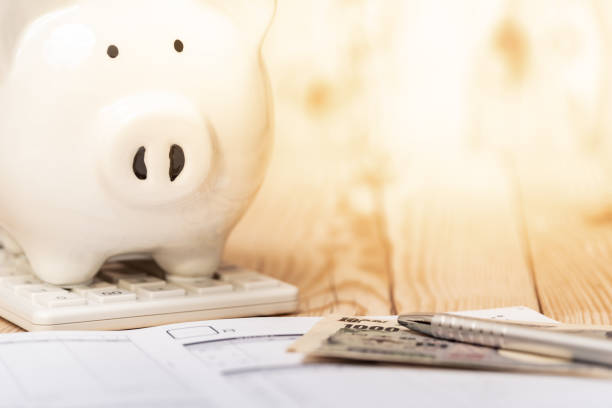 istock Saving Concept with Piggy Bank. 1301222221
