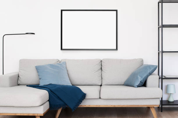 istock Frame for artwork mockup on white wall. Living room design 1301228248