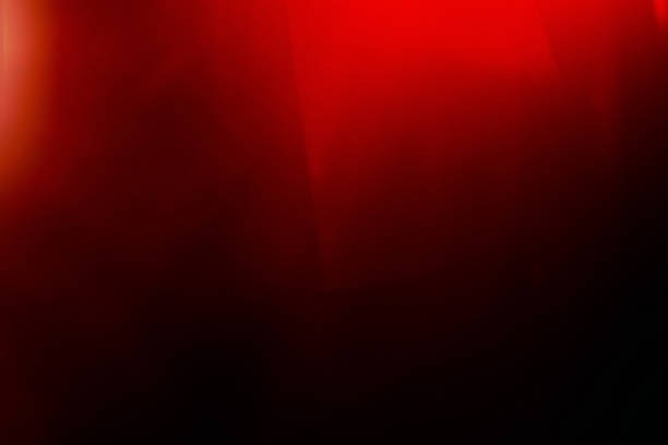istock red overlay lens flare effect defocused glow dark 1301230420