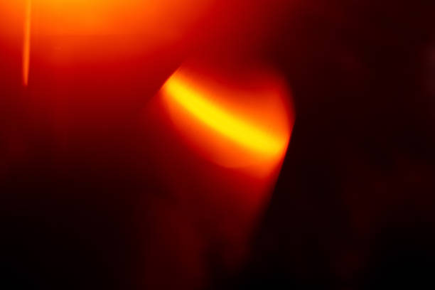 istock lens flare defocused glow light leak orange flecks 1301230422