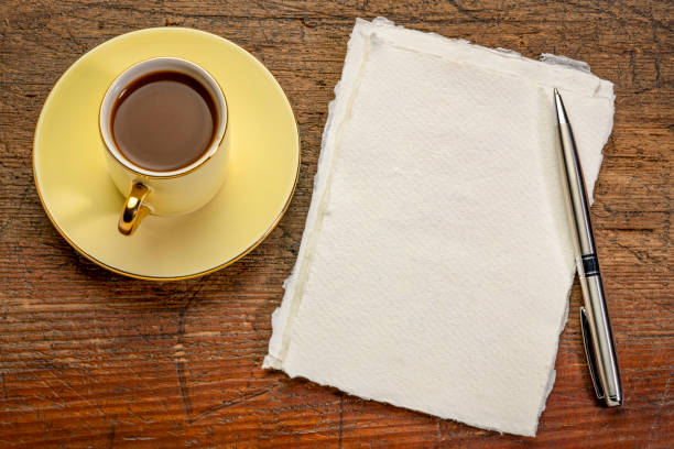 istock blank sheet of rag paper with coffee 1301233250