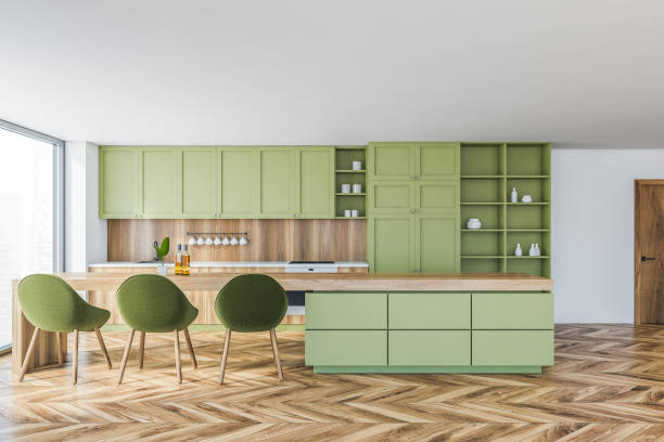istock White and green kitchen with table and door 1301234125