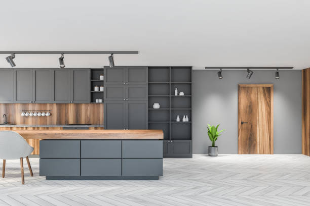 istock White and gray kitchen interior with table and door 1301236434