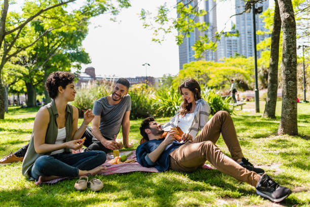 istock Two couples relaxed on the lawn in Buenos Aires 1301236973