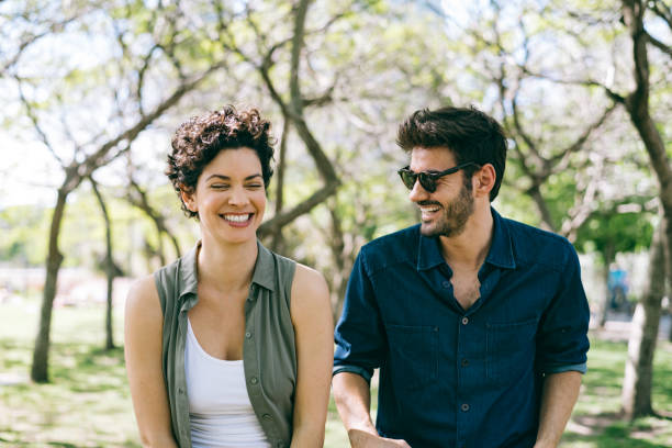 Relaxed couple in public park