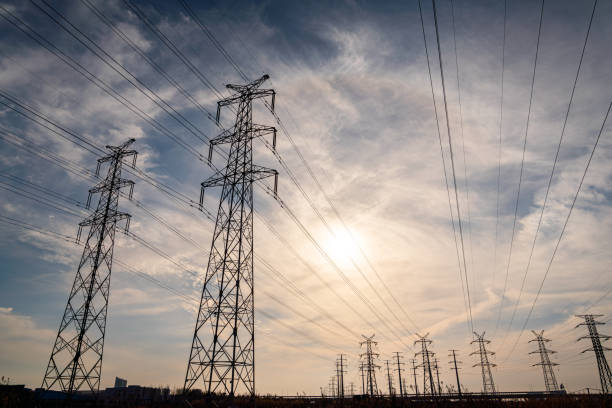 istock Low angle view of transmission towers 1301237057