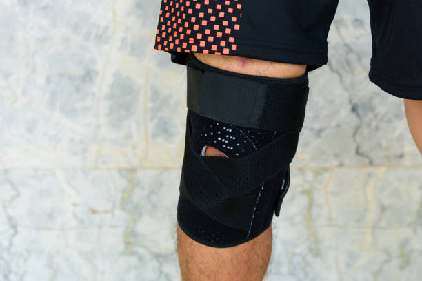 istock Knee Support with sunlight in the park / Brace Knee Pads Leg 1301237123