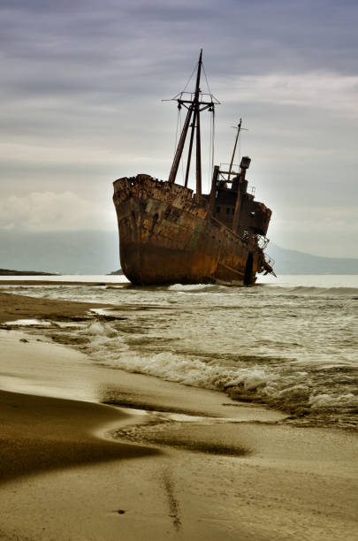 istock Dimitrios is an old ship wrecked on the Greek coast and abandoned on the beach 1301237130