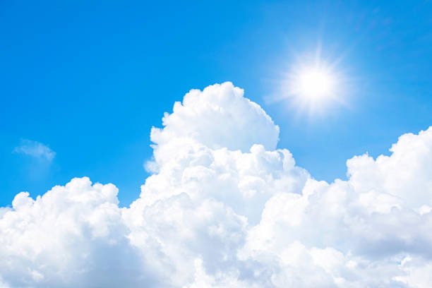 istock The sky is full of clouds floating around, both small and large, the sun is shining brightly 1301237253