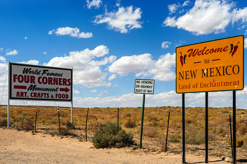 Four Corners, USA - Oct 2, 2015: View at the information signs by the road at Four corners, USA