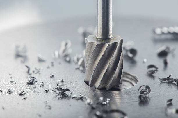 istock Milling cutter make sink in hole in steel billet. Locksmith work. 1301239123