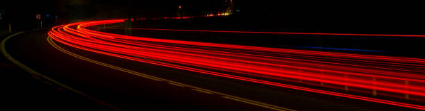 istock lights of cars with night. long exposure 1301239727