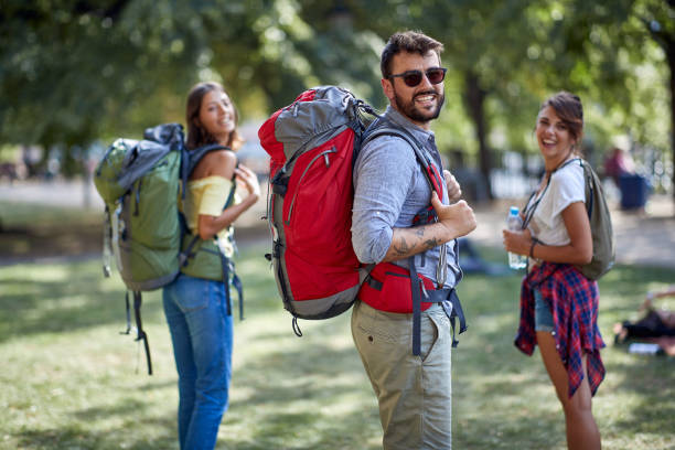 istock Group of three travellers sightseeing 1301242952
