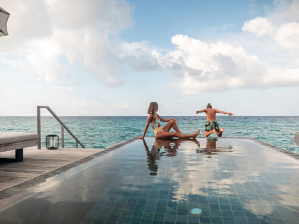 istock Couple enjoying luxury vacations 1301243242