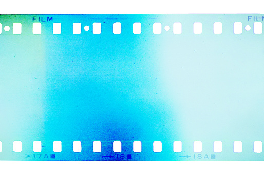 Old grunge filmstrip light blue