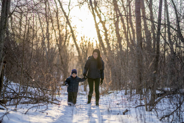 istock Mother and son enjoying winter 1301256556