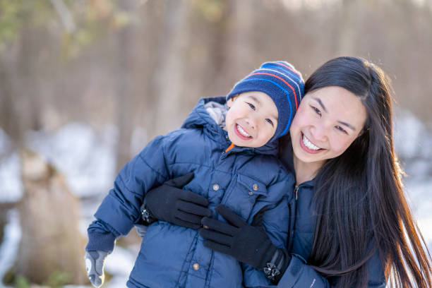 istock Mother and son enjoying winter 1301256585
