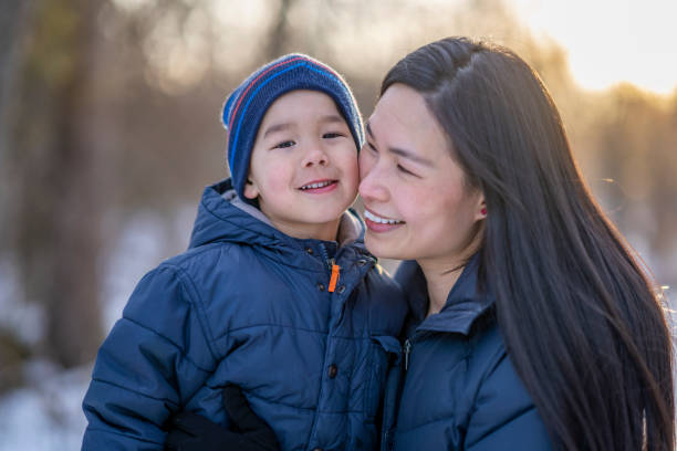 istock Mother and son enjoying winter 1301256644