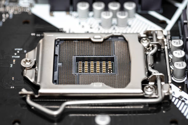 istock Macro shot of empty modern LGA 1200 socket for CPU on black desktop motherboard. 1301256801