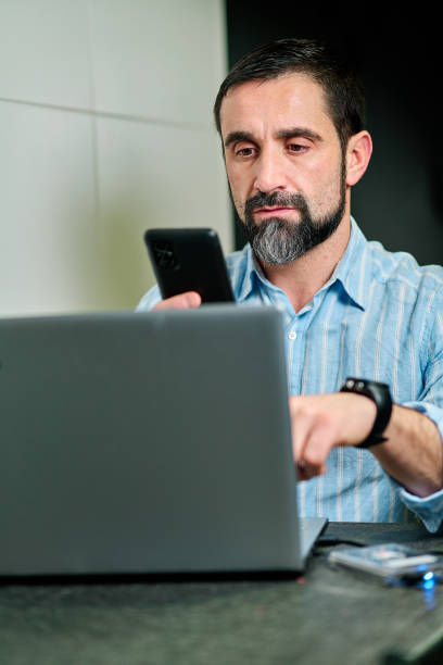 istock white man reading in the phone 1301256813