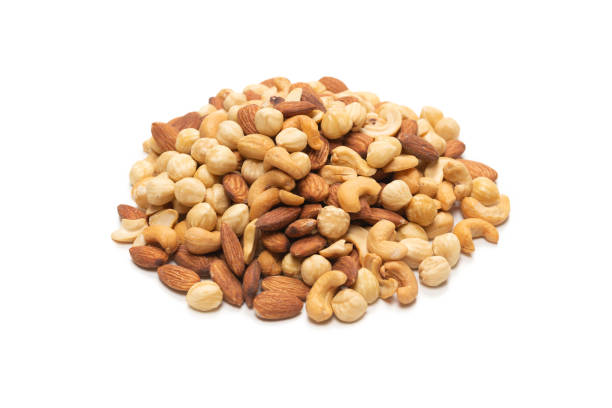 istock Mix of nuts isolated on white background. Top view. 1301259045