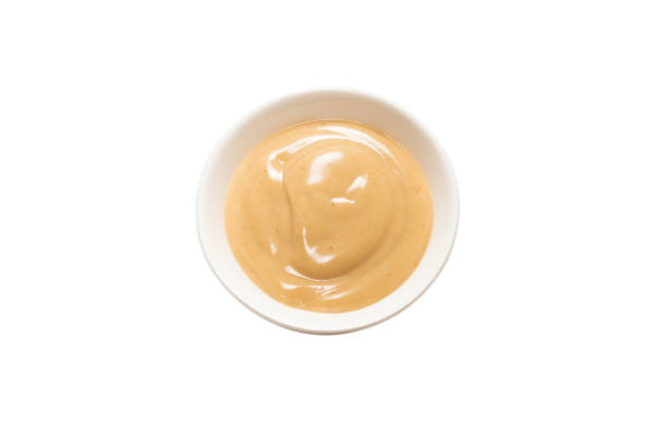istock Mushroom sauce in a bowl isolated on white background. 1301259061