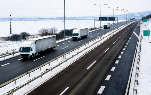 istock Convoy of Trucks in Winter 1301262747
