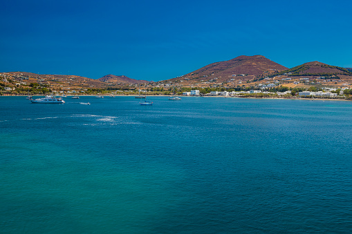 Paros island harbor with beach in the Agean Sea, Greece.