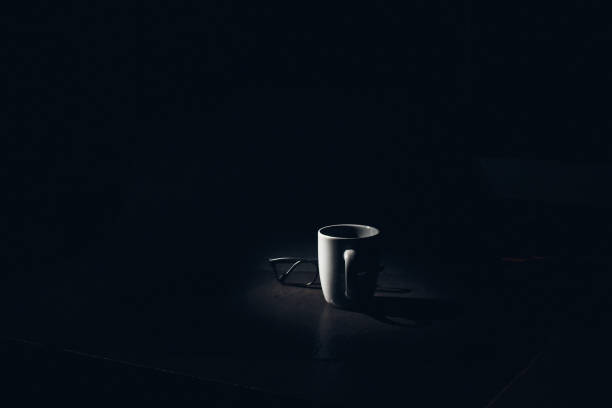istock cup of coffee and coffee beans, work from home concept 1301263134