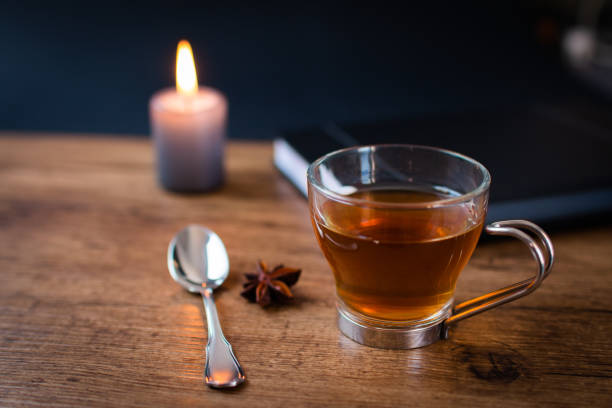 istock tea cup with wooden fo,do, concept to work from home during pandemic 1301265361