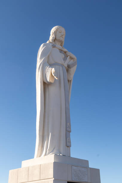 Sacred Heart of Jesus statue at the Mother Cabrini shrine near Golden, Colorado. Golden, Colorado - January 1, 2021: Sacred Heart of Jesus statue at the Mother Cabrini shrine near Golden, Colorado. The statue was designed by Maurice Loriaux in 1954 goldco info stock pictures, royalty-free photos & images