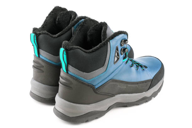 istock pair of mint blue insulated winter warm three quarter sneaker or boot isolated on white background 1301272202