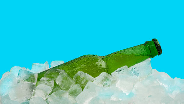 istock One bottle of cold lager beer on ice cubes 1301273011