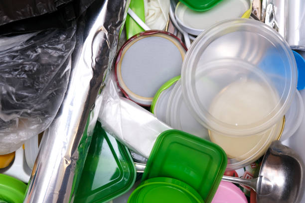 istock A lot of plastic waste in a kitchen drawer, plastic containers and kitchenware in mess, recycling concept 1301273952