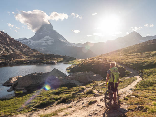 istock Male mountain biker admire the view from Riffelsee Lake 1301275128
