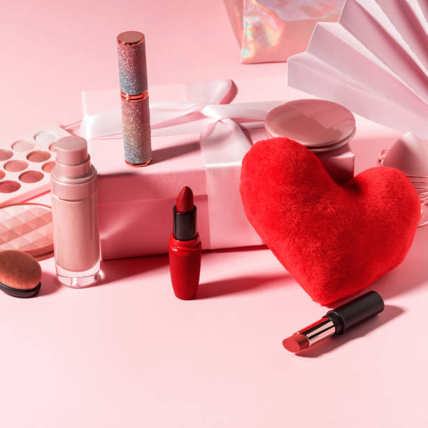 istock Cosmetics beauty background with red heart on pink 1301276476