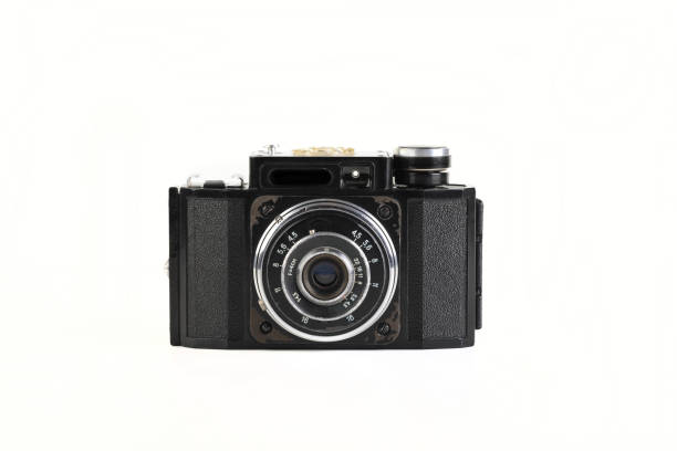 istock Old 35mm bakelite scaling film camera on white background. 1301276992