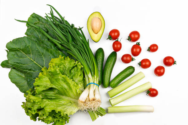 istock Fresh vegetables with avocado. healthy food background Isolated on white 1301278376