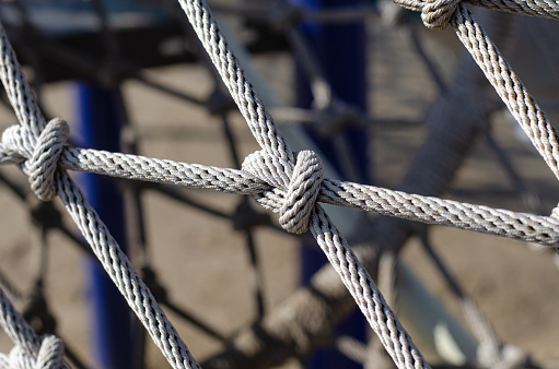 Synthetic rope. Rope knot. Marine rope. Harness. Equipment for climbers.