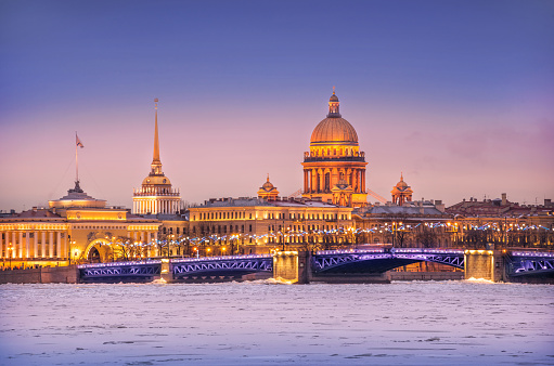 The dome of St. Isaac's Cathedral, the Admiralty and the Neva River in ice in St. Petersburg