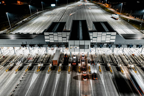 istock Toll booth seen at night from a drone perspective 1301282855