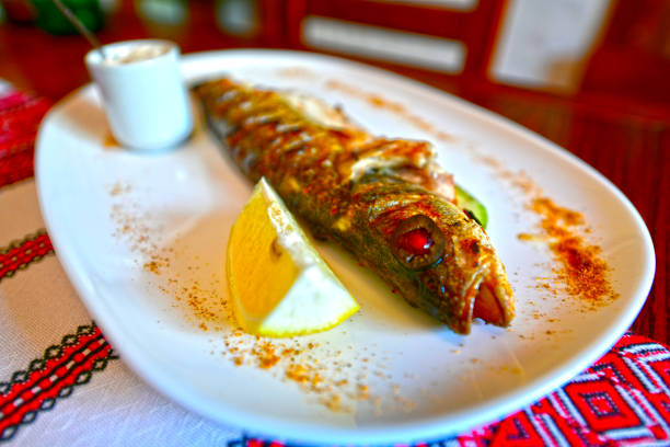 Delicious and healthy seafood dishes. restaurant serving dishes.