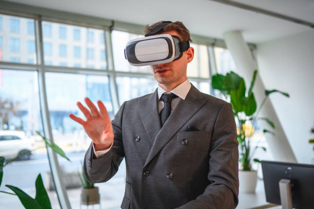istock Mature Caucasian Businessman with Virtual Reality Simulator Working in Office 1301284822