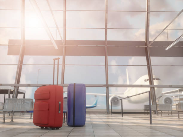 istock An empty airport terminal hall with an airplane in the background. render 3d 1301289764