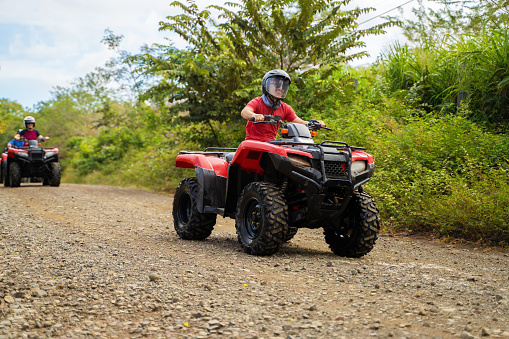 Teen boy driving a 4x4 vehicle in Costa Rica