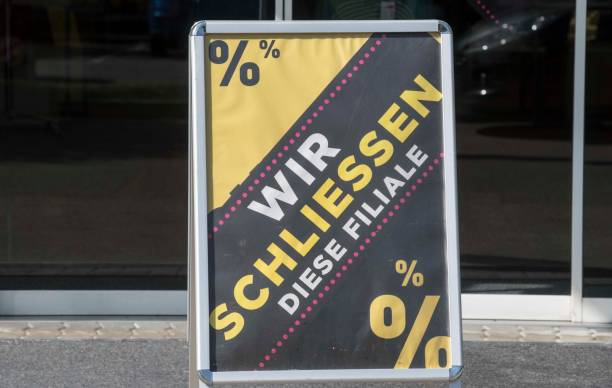 istock sale sign at a shop 1301294138