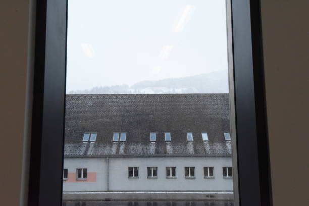 istock snow on a roof in winter 1301294182
